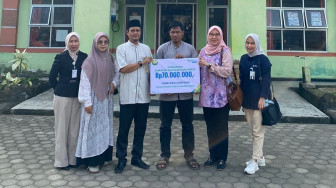 BPJS Ketenagakerjaan Serahkan Santunan JKK Rp70 Juta di SMKN 1 Muaro Jambi